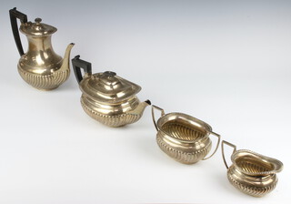 An Edwardian silver 4 piece tea and coffee set with demi fluted decoration, ebony mounts, Sheffield 1901, gross weight 1880 grams 