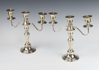 A pair of silver 3 light candelabra Sheffield 1975, 23cm, weighable sconces 786 grams 