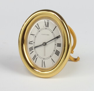 A Cartier gilt cased easel timepiece with quartz movement 9cm 