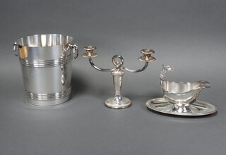 A silver plated Christofle ice bucket 20cm, ditto sauce boat and 2 light candelabrum 