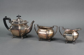 A silver plated 3 piece octagonal tea set with ebonised mounts 
