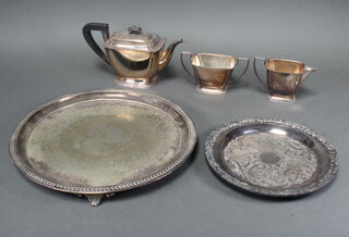 A silver plated Art Deco 3 piece tea set and 2 plated trays