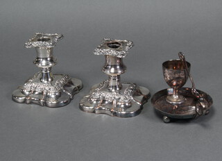 A pair of silver plated dwarf candlesticks and minor plated wares