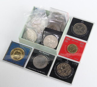 A collection of commemorative crowns and coins 