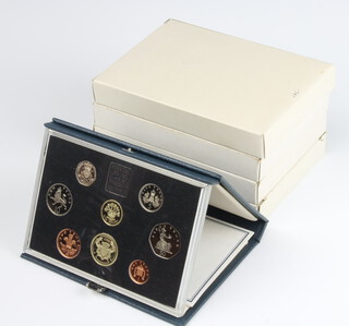Five United Kingdom proof coin sets 1983, 1984 x 2, 1985 and 1986 