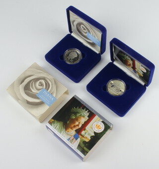 A 2002 presentation silver Golden Jubilee crown, a 1997 Memory of Diana Princess of Wales five pound crown boxed  