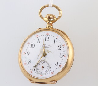 A yellow metal 18k ladies fob watch with enamelled dial and engraved monogram contained in a 60mm case  