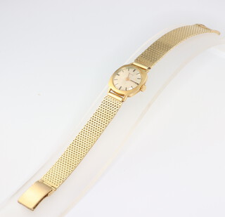 A ladies yellow metal 18k Glycine wrist watch on a yellow metal 585 bracelet, gross weight including movement 28.8 grams 