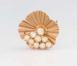 A yellow metal diamond and seed pearl floral pin 2.5cm 