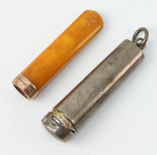An Edwardian silver cheroot holder Birmingham 1904 with a gold mounted amberoid cheroot holder 
