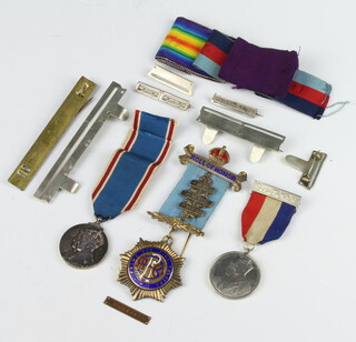 A George VI Coronation medal, a silver gilt Masonic jewel, minor ribbons and bars etc 
