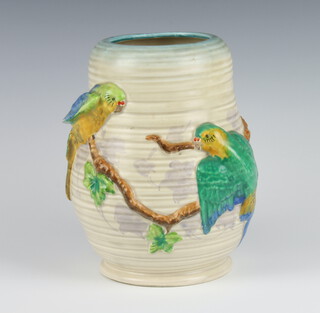 A Clarice Cliff moulded oviform jug decorated with parrots no.2/7778 20cm 