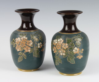 A pair of Langley oviform vases with incised floral decoration and flared necks 21cm 