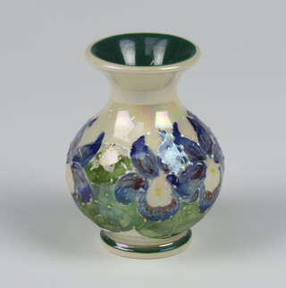 A contemporary Moorcroft baluster vase decorated with stylised flowers dated 2000, 8cm 