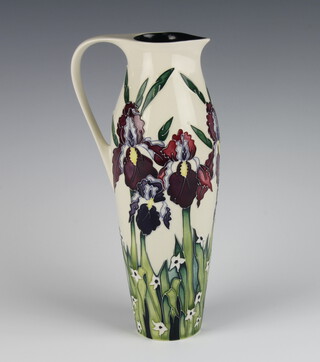 A contemporary Moorcroft ewer, the cream ground decorated with iris dated 2004, 27cm 