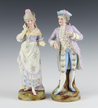 A pair of 19th Century German bisque figures of a lady and gentleman 34cm 