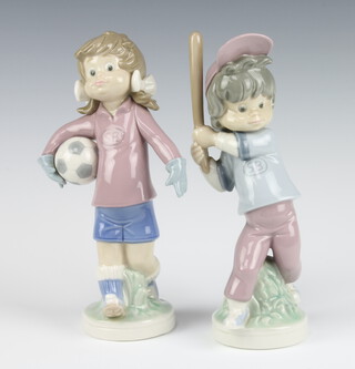 Two Lladro Sport Billy figures - boy baseball player 25cm and girl footballer 24cm 