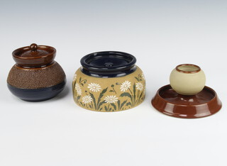 A Langley match holder striker ashtray 9cm, a tobacco jar decorated with flowers 10cm, a bulbous ditto 12cm 
