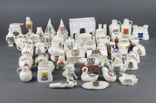 A collection of crested china including a Norwich Warbler, a Tenby oast house, a Matlock Bath elephant and 48 others 