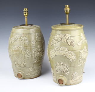 A pair of Victorian stoneware barrels with moulded decoration, one marked Rum converted to electricity 35cm 