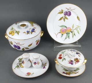 A part dinner service of Royal Worcester Evesham china comprising 11 small plates, 5 medium plates, 7 dinner plates, a serving dish, 1 large tureen and cover, 3 medium tureens and covers, 2 small tureens and covers, 2 peppers (1 cracked) and 1 salt  