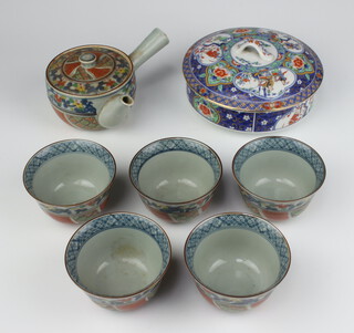 A 20th Century Saki pot (chipped lid) and 5 saki bowls together with a circular lidded pot 