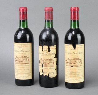 Three bottles of 1969 Chateau Bouscaut Domaine Wohlstetter-Sloan Bordeaux red wine (wine just on the shoulder, labels are damaged)  