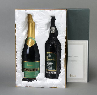 A bottle of Harrods Premier Cru champagne together with bottle of Harrods Finest Reserve Port by Dow's boxed 