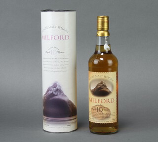 A 700ml bottle of Milford limited edition 10 year old New Zealand single malt whisky, boxed (the distillery closed in 1997) 