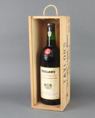 A 300cl bottle (double magnum) of Taylor's Special Lodge Vintage Champagne Port retailed at Harrods, contained in a Harrods wooden box (on the shoulder) 