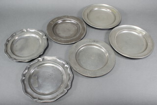 A pair of 17th/18th Century pewter plates with bracketed borders and London touch marks 23cm and 2 other pairs of pewter plates with London touch marks 23cm and 24cm  