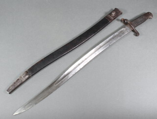 An 1856 patent Enfield sword bayonet complete with scabbard 