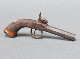 A 19th Century percussion pocket pistol, the 8.5cm octagonal barrel with 2 proof marks and having a walnut chequered grip 19cm overall  