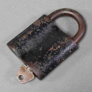 A curious 19th/20th Century shaped iron padlock, complete with key 13.5cm x 9cm x 2cm 