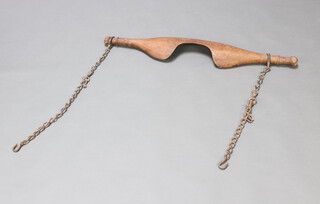 A 19th Century Continental pine yoke with iron chains 90cm x 18cm 
