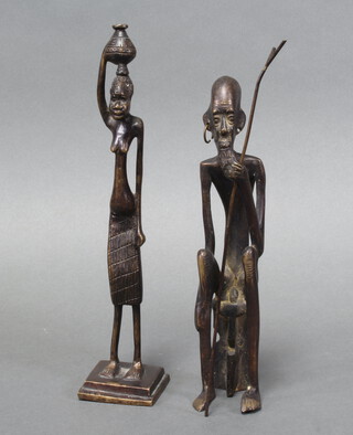 A Benin style bronze of a standing lady with water pot, raised on a square base 31cm x 6cm x 6cm and 1 other of a seated gentleman with stick (missing an earring) 27cm x 6cm x 5cm 
