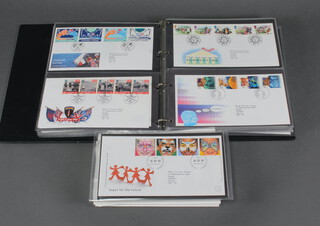 An album of GB first day covers 1991-2001 and a collection of loose first day covers 2001-2004 