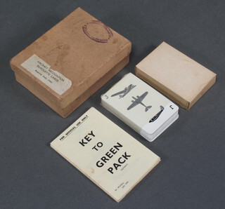 Four packs of Second World War aircraft recognition silhouette cards, green pack, blue pack, red pack and orange pack together with key, in original box with Gunnery Officer of RN Barracks Portsmouth rubber stamp 
