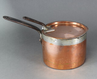 A Lans and Sons of 26 Bury Street London, a copper saucepan with coronet of the Duke of Northumberland and marked NH (Northumberland House) marked DN11 1856 NH21 13 x 18cm 