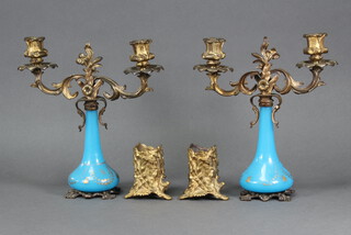 A pair of 19th Century gilt metal spill vases in the form of tree stumps with ivy decoration and decorated seated toads and lizards 9cm x 8cm (both have holes to the side) together with a pair of blue glass and gilt metal twin light candelabrum 25cm x 24cm  