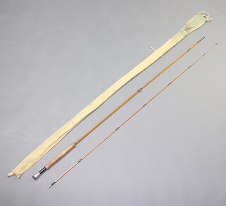 A Hardy's two piece split cane fly fishing rod 10' "The Reservoir Fly Palicona" contained in a green cloth bag  