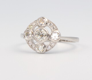 A white metal stamped Plat Edwardian style diamond cluster ring 0.8ct, 4 grams, size N1/2