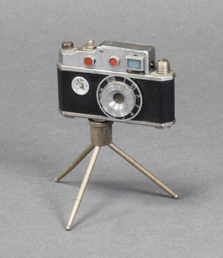 A Orion lighter in the form of a camera, the base marked Made in Occupied Japan 9cm x 6cm x 1cm 