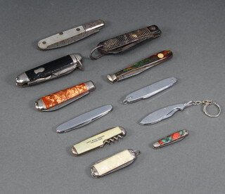 Richards of Sheffield, a pocket knife with 3cm blade and tartan grip pocket knife with 6cm blade orange grip, an Innox Ikco pocket knife with 7cm blade, a Richards double bladed penknife and 7 other various folding knives 