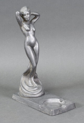 An Art Deco cast aluminium ashtray decorated a standing naked lady 29cm x 10cm x 20cm 