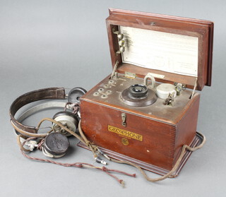 A BBC Gecophone D.C. 1001 crystal set with 2 sets of headphones 