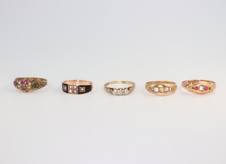 Five 9ct yellow gold gem set rings size N, 7.8 grams