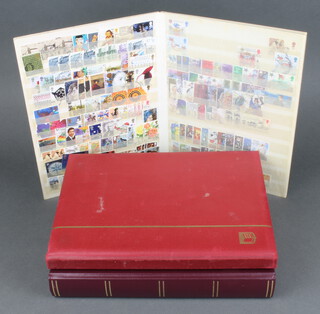 A stock book of used GB stamps Edward VIII to Elizabeth II, 2 stock books of mint and used world stamps - America, Gibraltar, Spain 