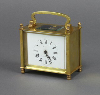 Eureka 20th Century French carriage timepiece with enamelled dial and Roman numerals contained in a gilt metal case marked Eureka France 9cm h x 9.5cm w x 5cm d, complete with a wooden carrying case 
