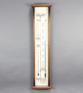 A Dutch Fitzroy style barometer contained in an oak case 103cm h x 25cm w x 8cm d 
